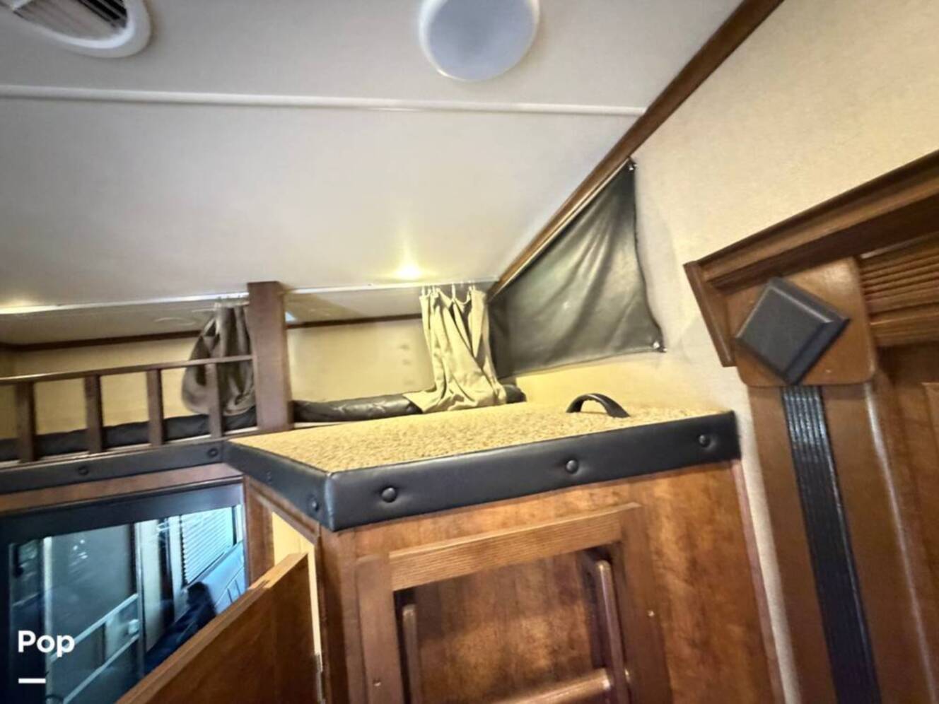 A photo of this 2015 Grand Design Momentum 385TH