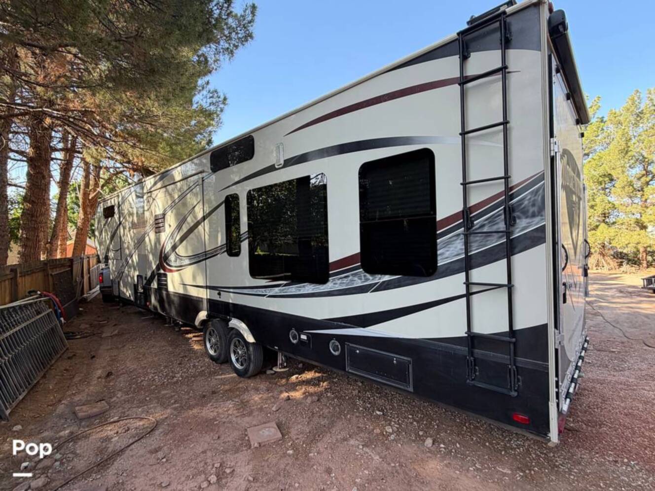 A photo of this 2015 Grand Design Momentum 385TH