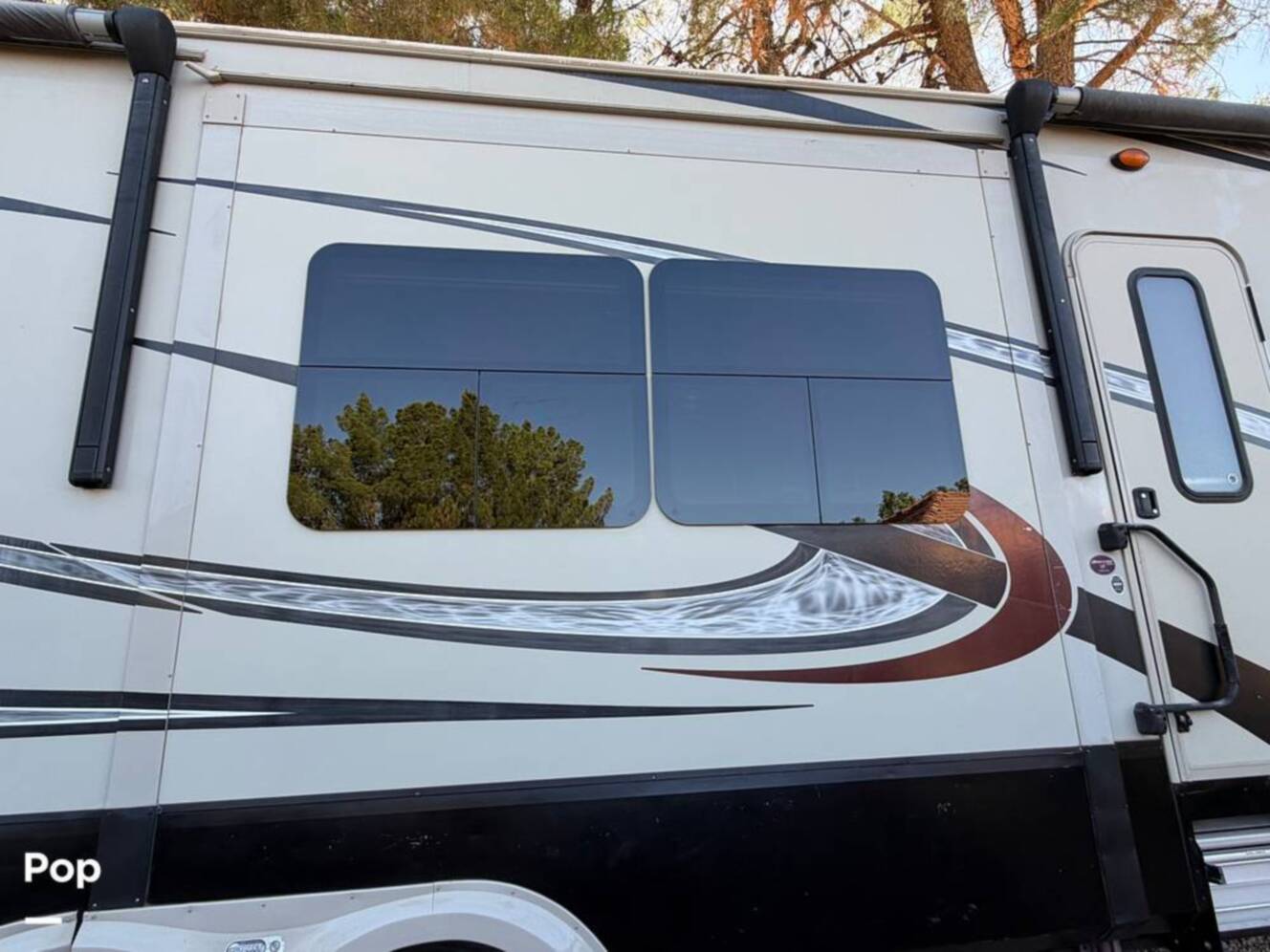 A photo of this 2015 Grand Design Momentum 385TH
