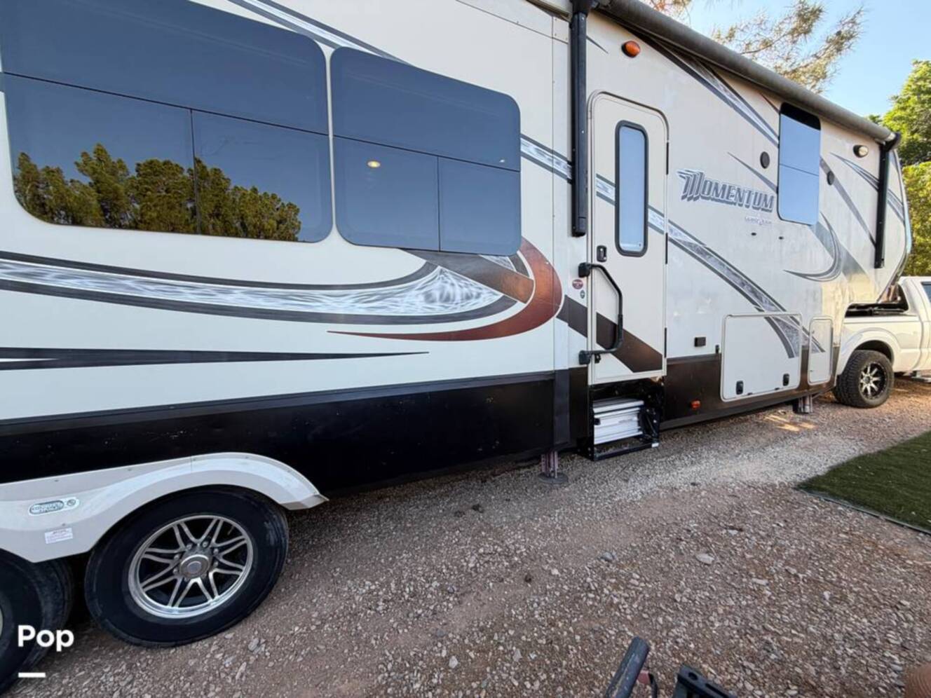 A photo of this 2015 Grand Design Momentum 385TH