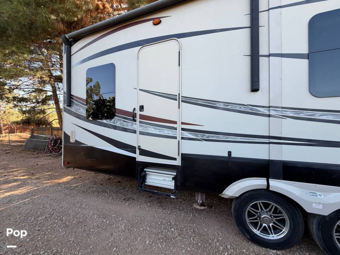 A photo of this 2015 Grand Design Momentum 385TH