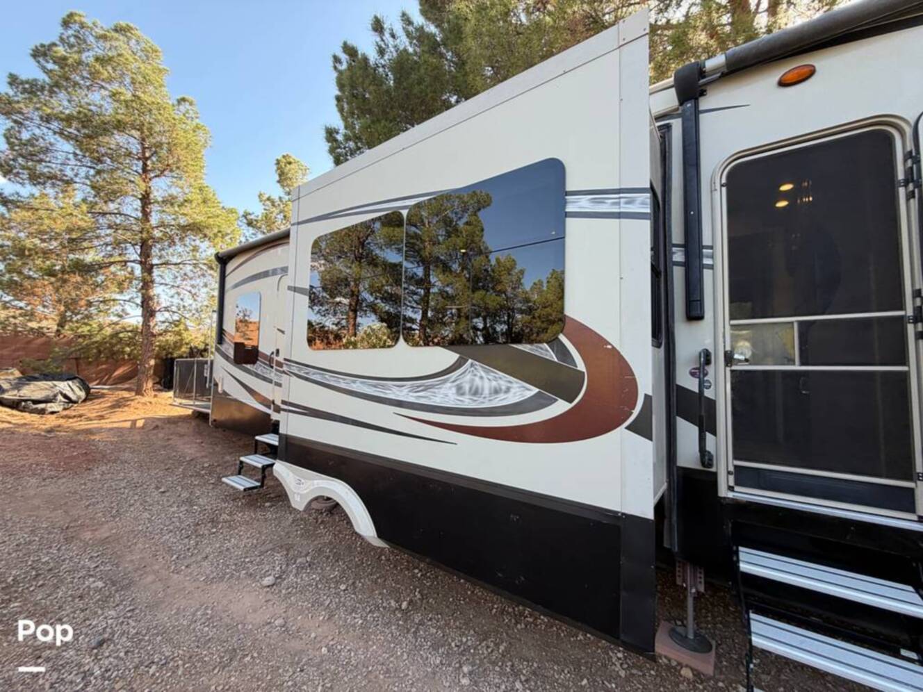 A photo of this 2015 Grand Design Momentum 385TH