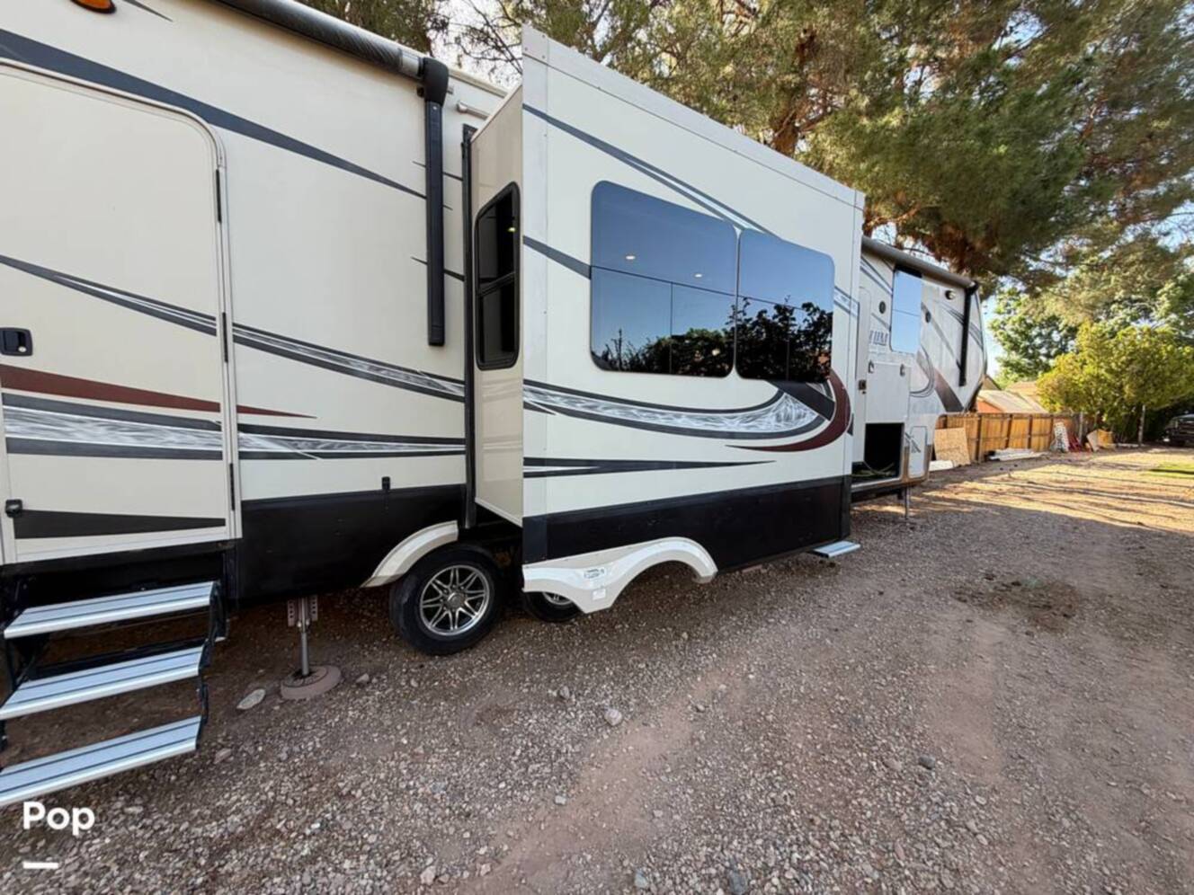 A photo of this 2015 Grand Design Momentum 385TH
