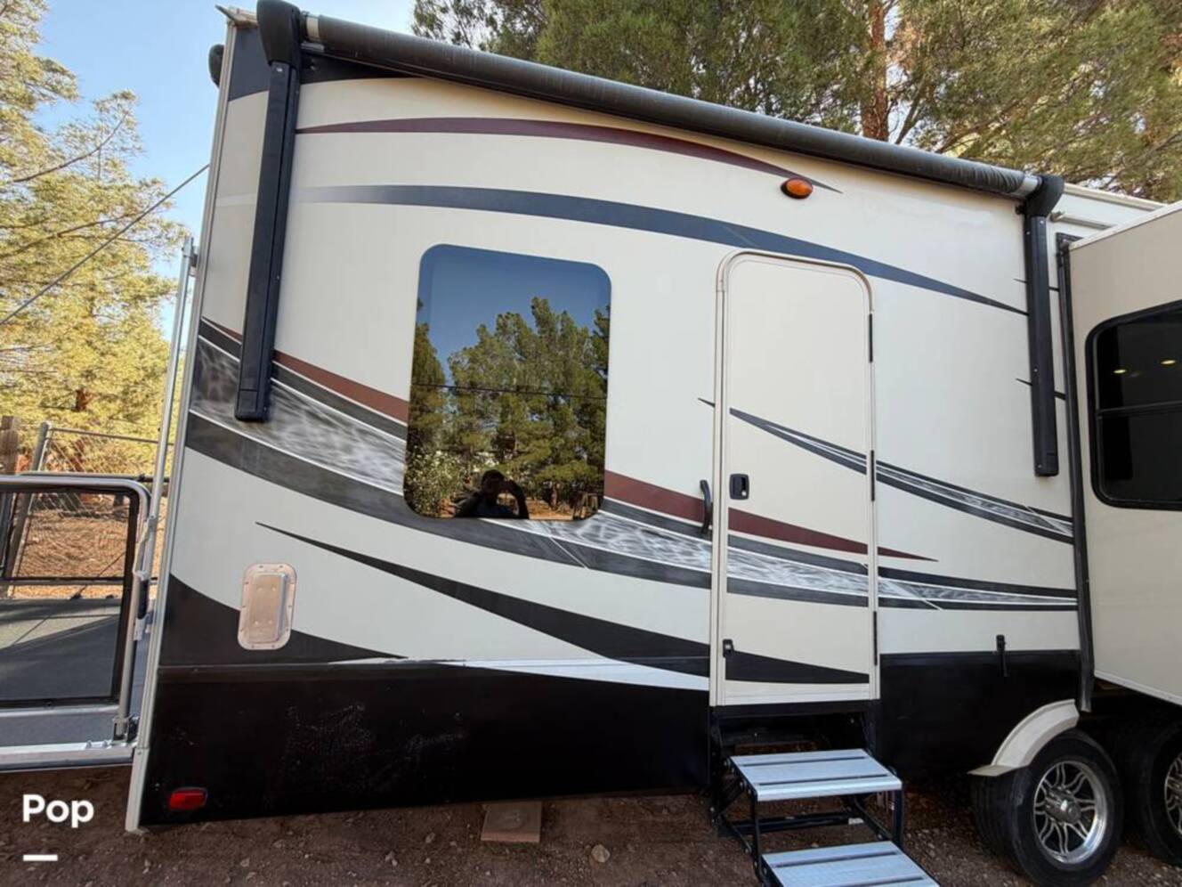 A photo of this 2015 Grand Design Momentum 385TH