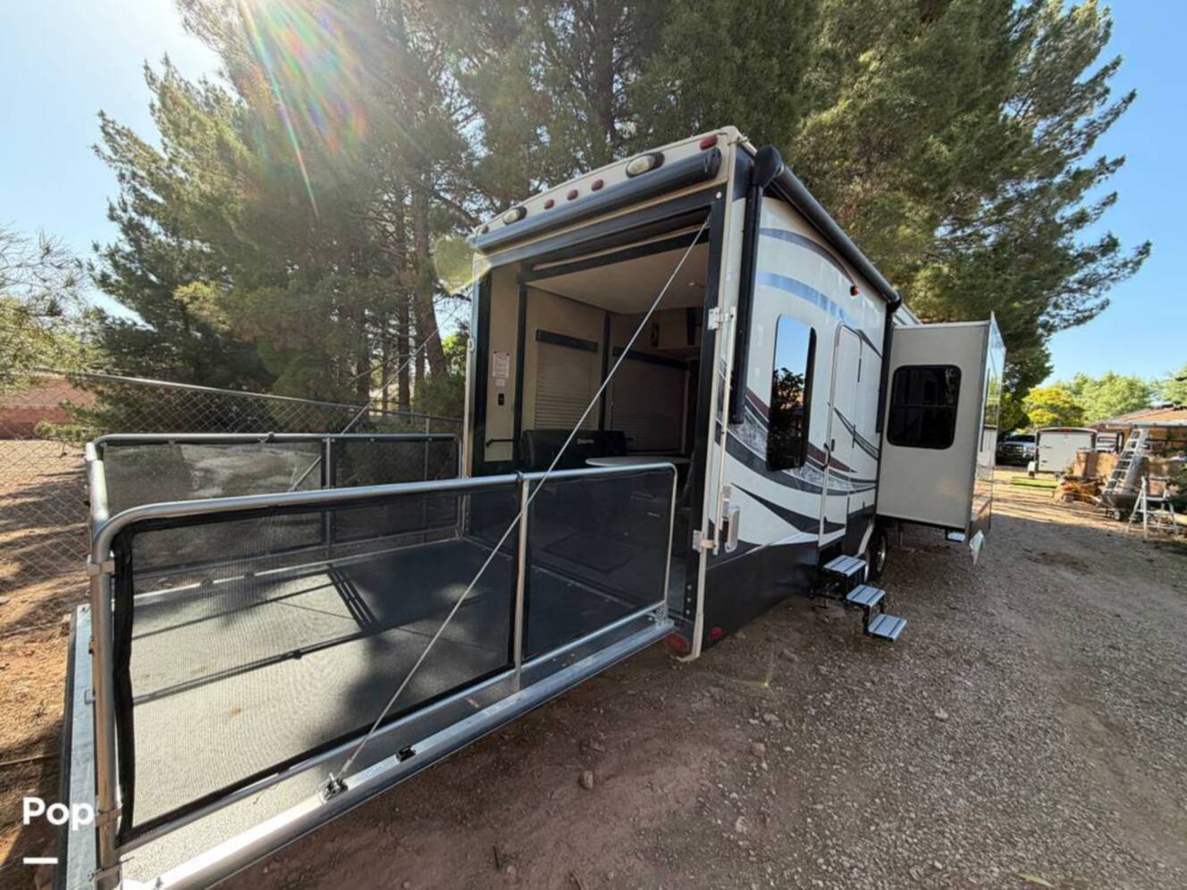 A photo of this 2015 Grand Design Momentum 385TH