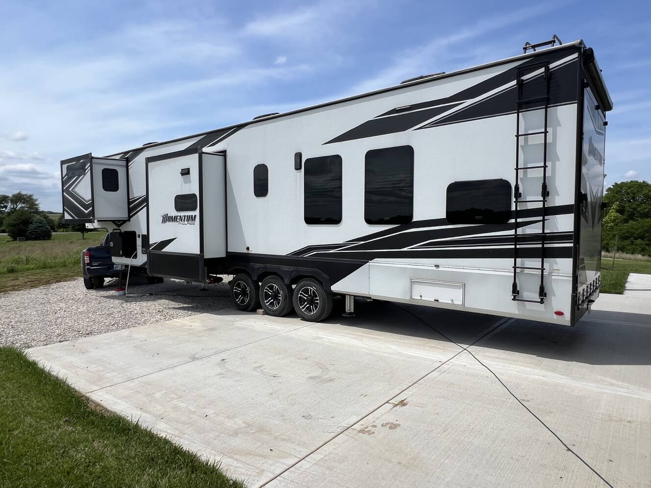 A photo of this 2022 Grand Design MOMENTUM 381MS