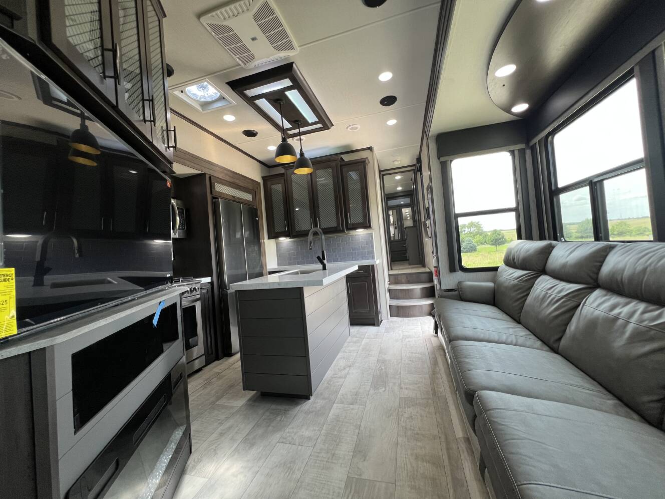 A photo of this 2022 Grand Design MOMENTUM 381MS