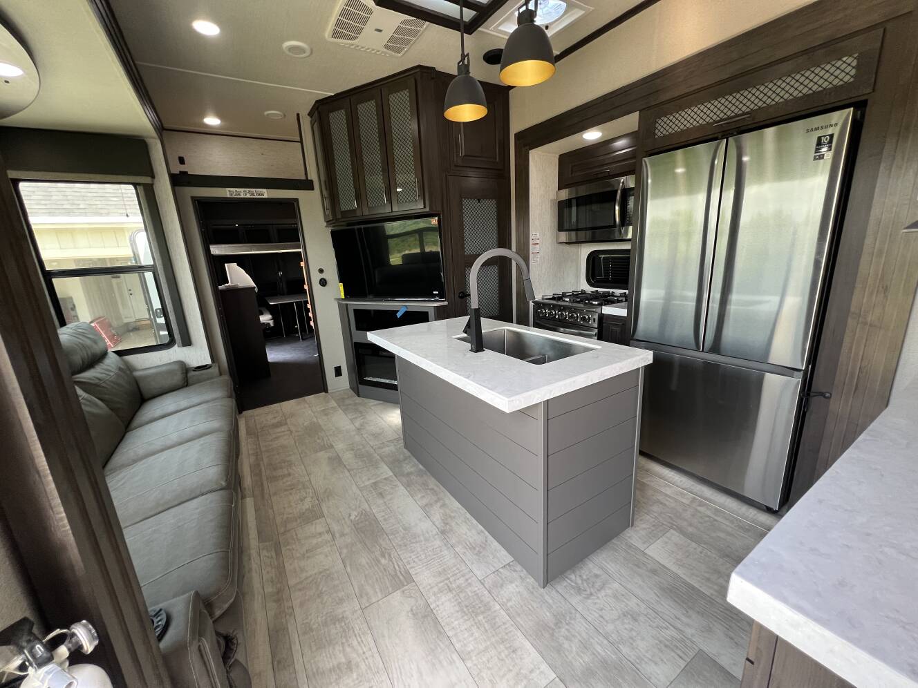 A photo of this 2022 Grand Design MOMENTUM 381MS