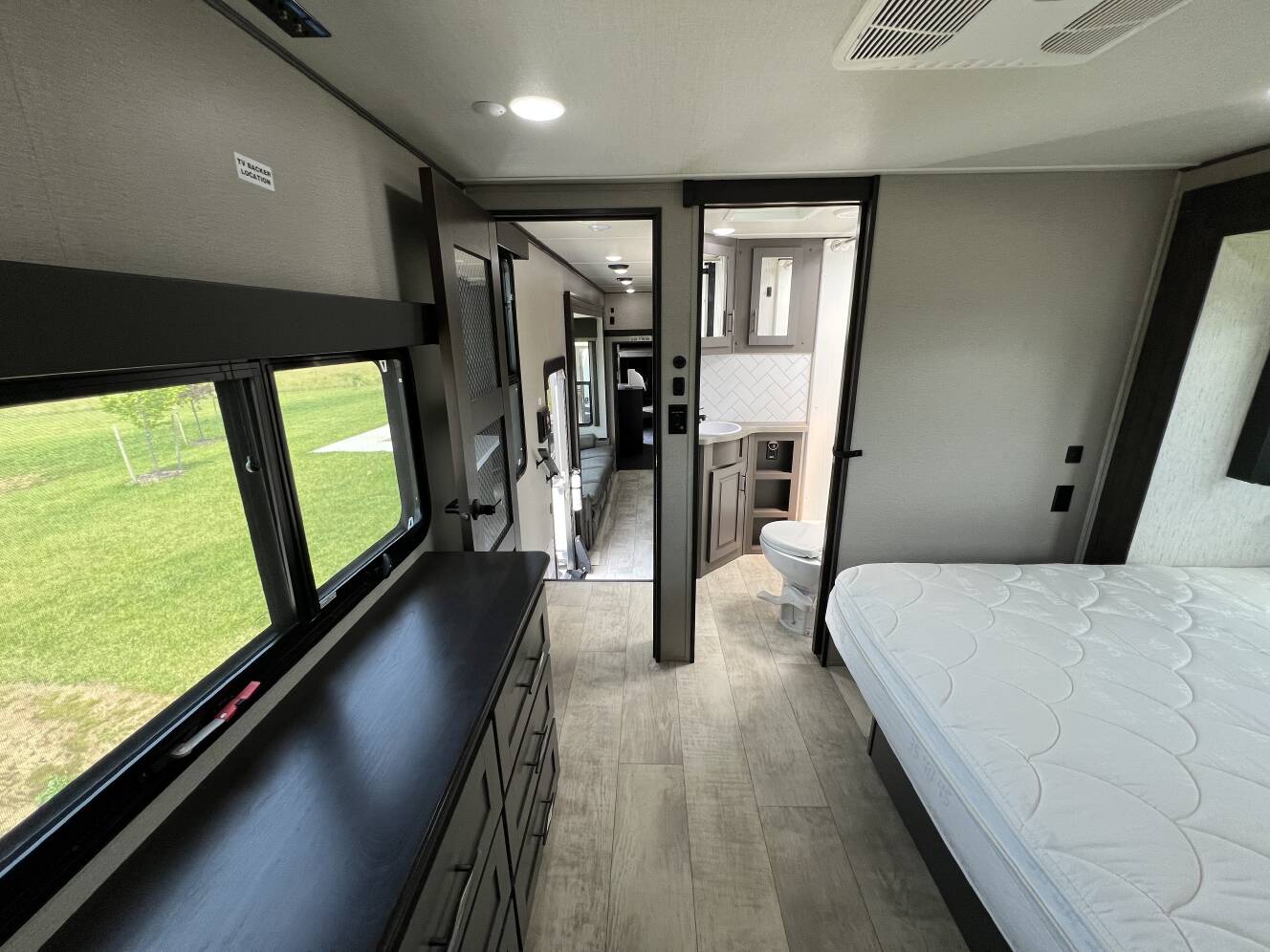 A photo of this 2022 Grand Design MOMENTUM 381MS