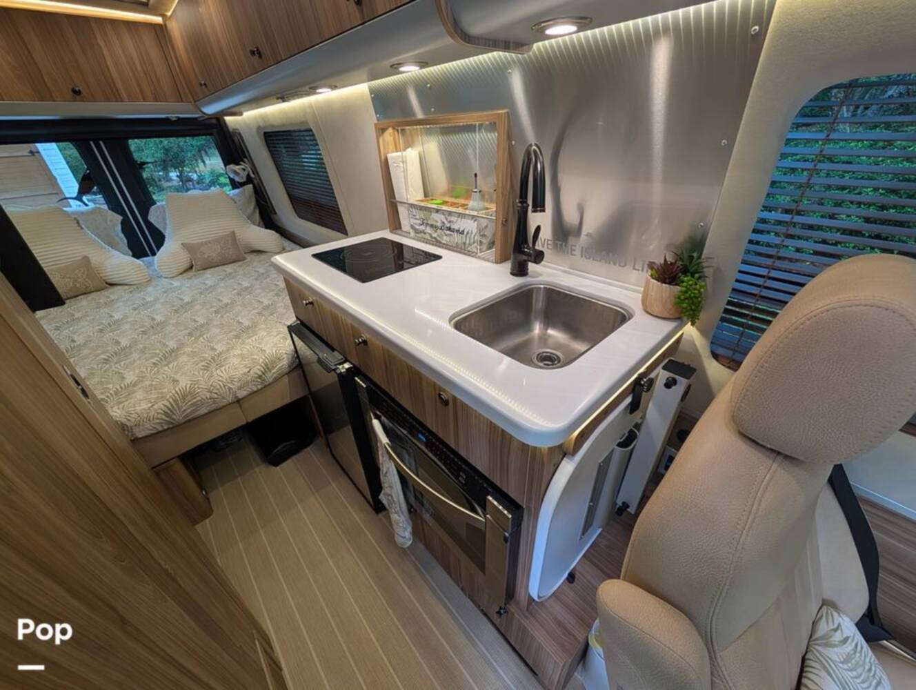 A photo of this 2023 Airstream Interstate Tommy Bahama E1 24GL