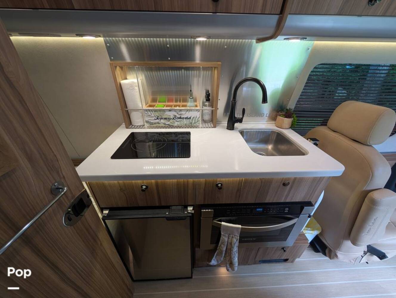 A photo of this 2023 Airstream Interstate Tommy Bahama E1 24GL