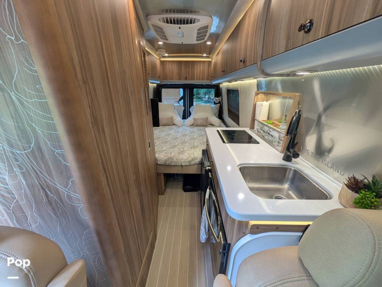 A photo of this 2023 Airstream Interstate Tommy Bahama E1 24GL