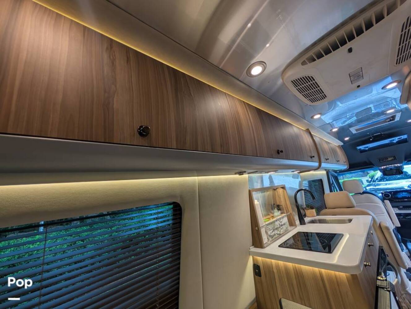 A photo of this 2023 Airstream Interstate Tommy Bahama E1 24GL