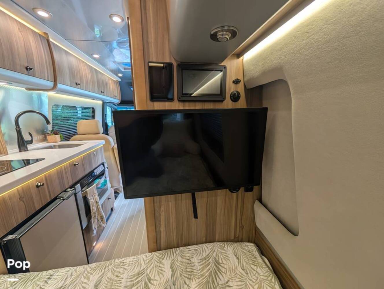 A photo of this 2023 Airstream Interstate Tommy Bahama E1 24GL