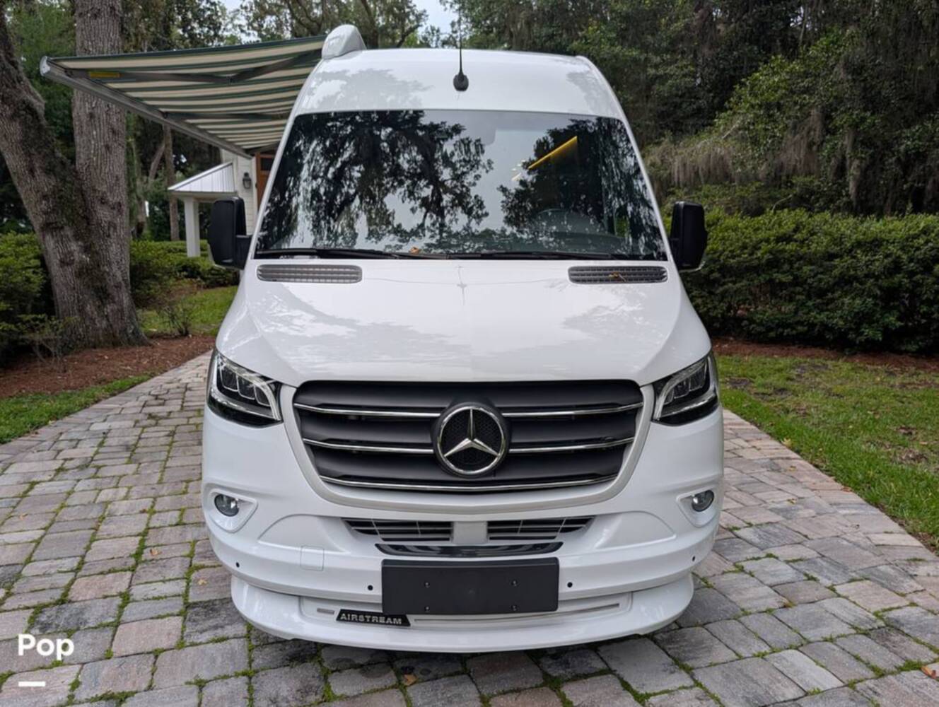 A photo of this 2023 Airstream Interstate Tommy Bahama E1 24GL