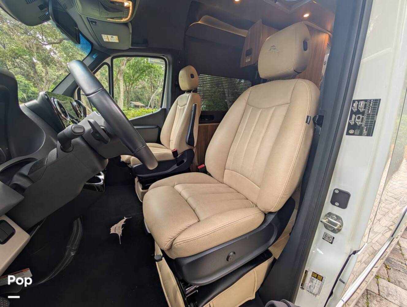 A photo of this 2023 Airstream Interstate Tommy Bahama E1 24GL