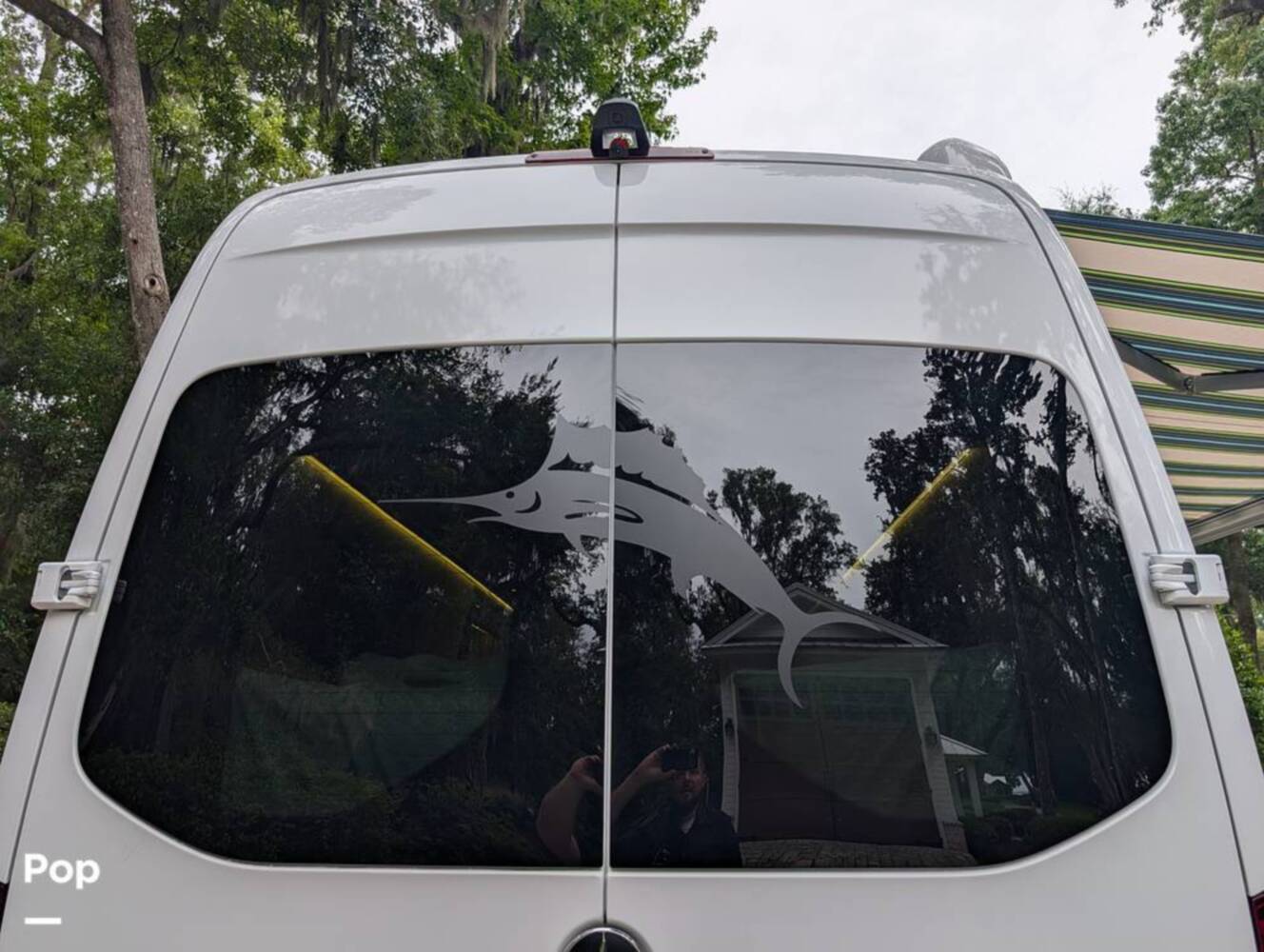 A photo of this 2023 Airstream Interstate Tommy Bahama E1 24GL