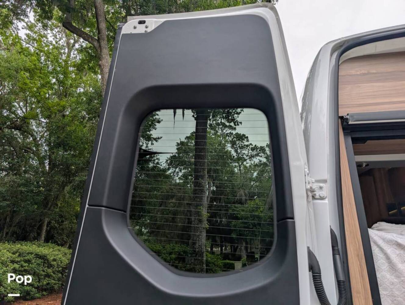 A photo of this 2023 Airstream Interstate Tommy Bahama E1 24GL