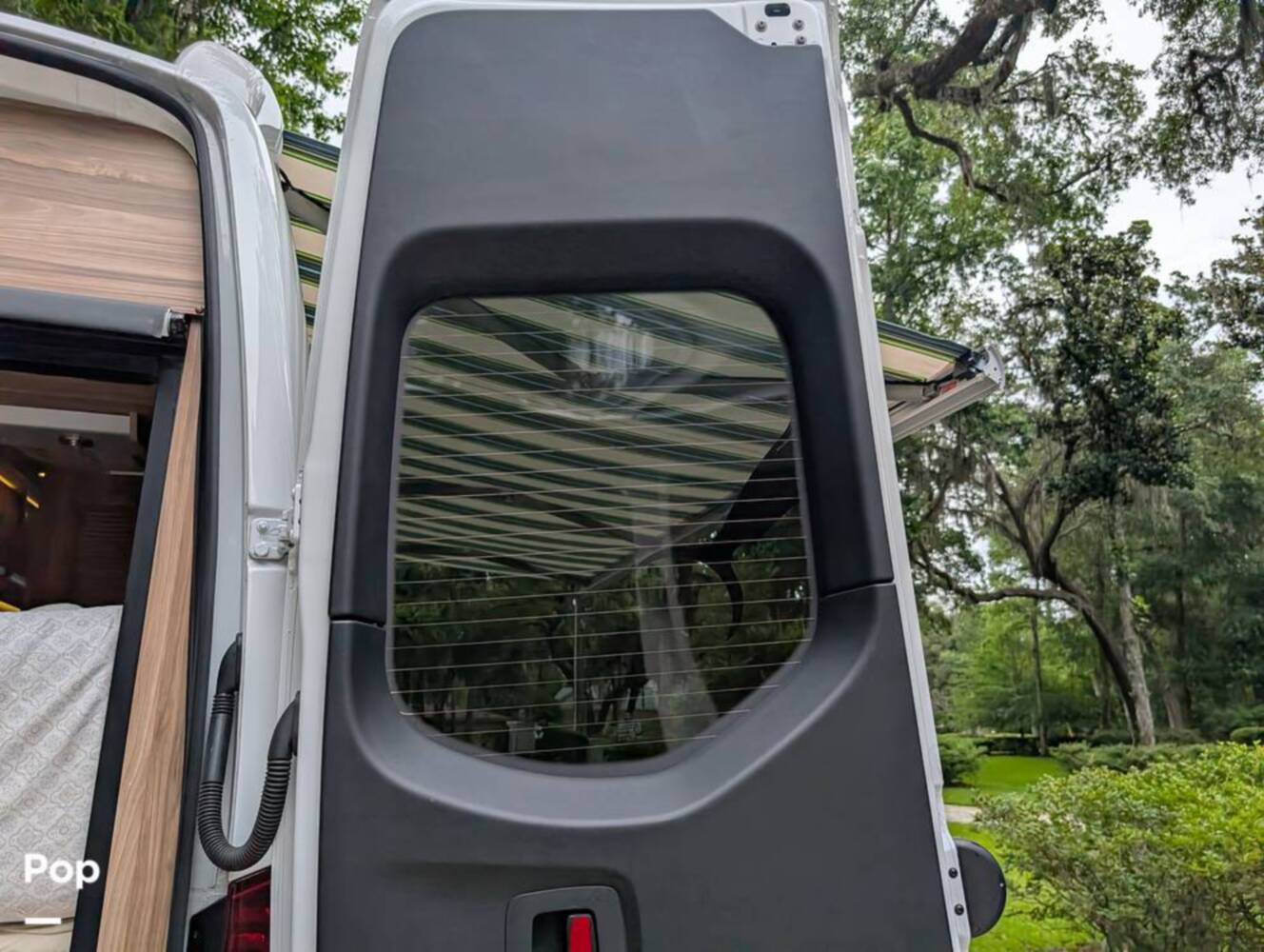 A photo of this 2023 Airstream Interstate Tommy Bahama E1 24GL