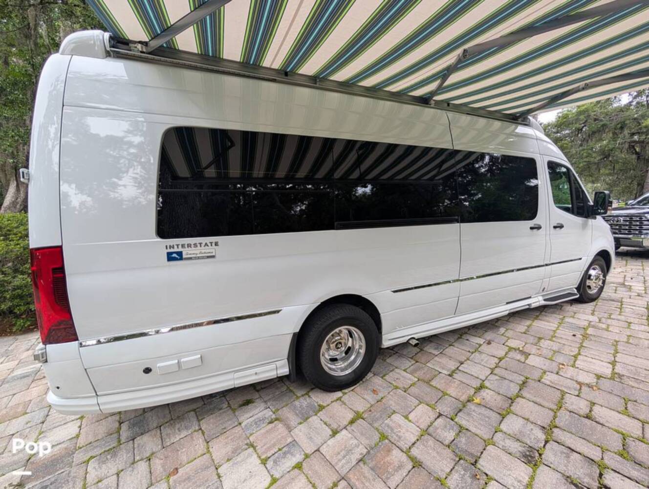 A photo of this 2023 Airstream Interstate Tommy Bahama E1 24GL