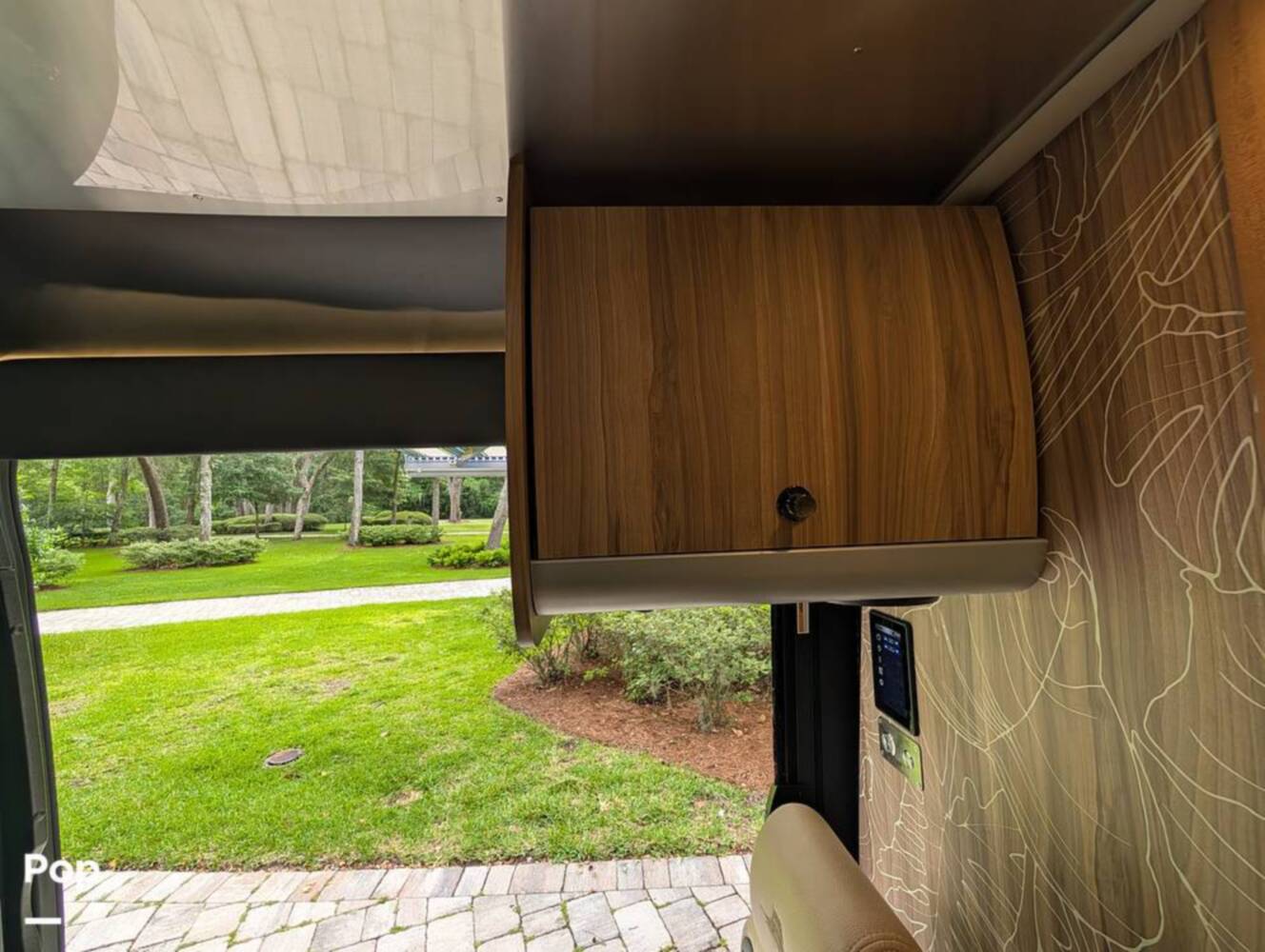 A photo of this 2023 Airstream Interstate Tommy Bahama E1 24GL