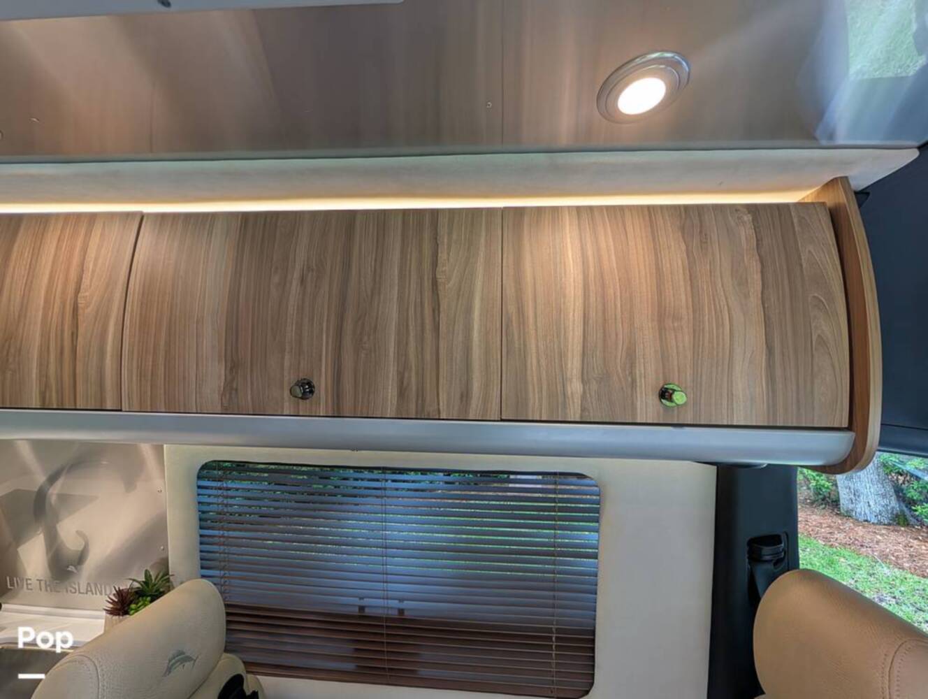 A photo of this 2023 Airstream Interstate Tommy Bahama E1 24GL