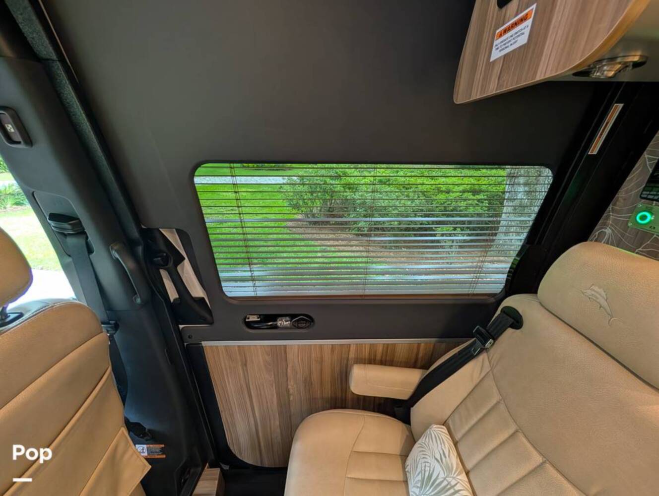 A photo of this 2023 Airstream Interstate Tommy Bahama E1 24GL
