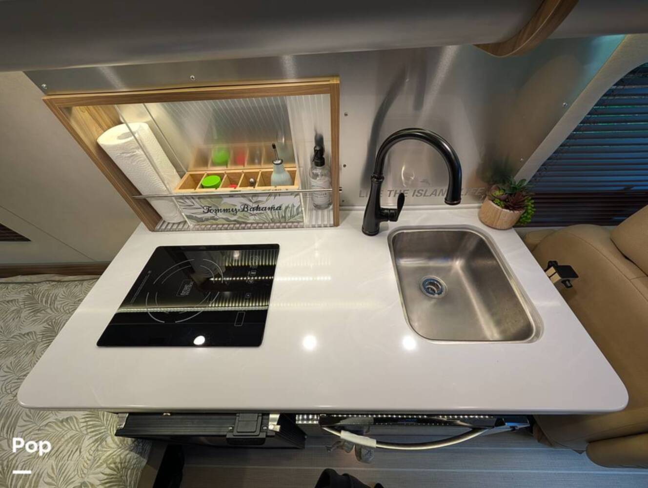 A photo of this 2023 Airstream Interstate Tommy Bahama E1 24GL