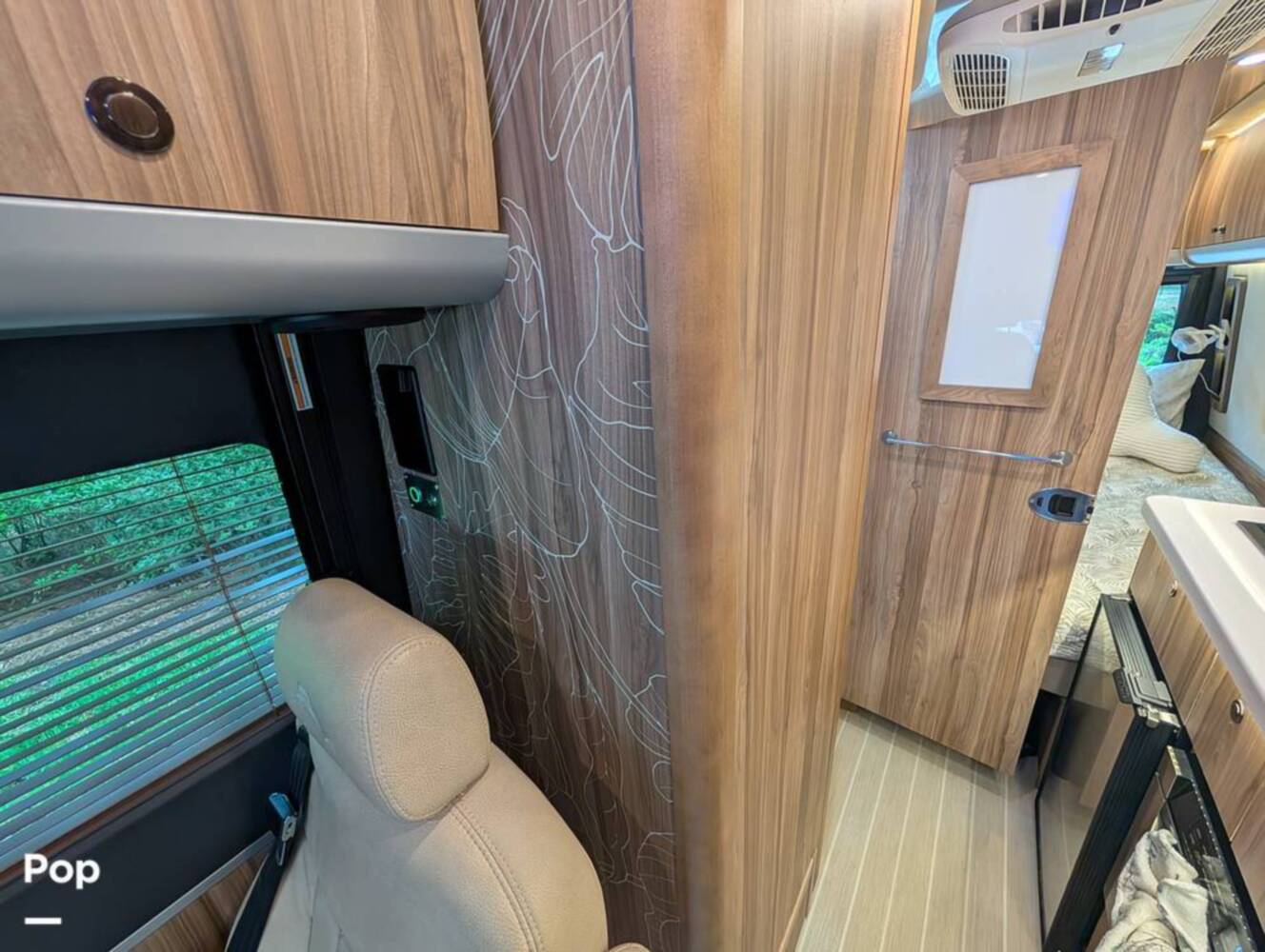 A photo of this 2023 Airstream Interstate Tommy Bahama E1 24GL
