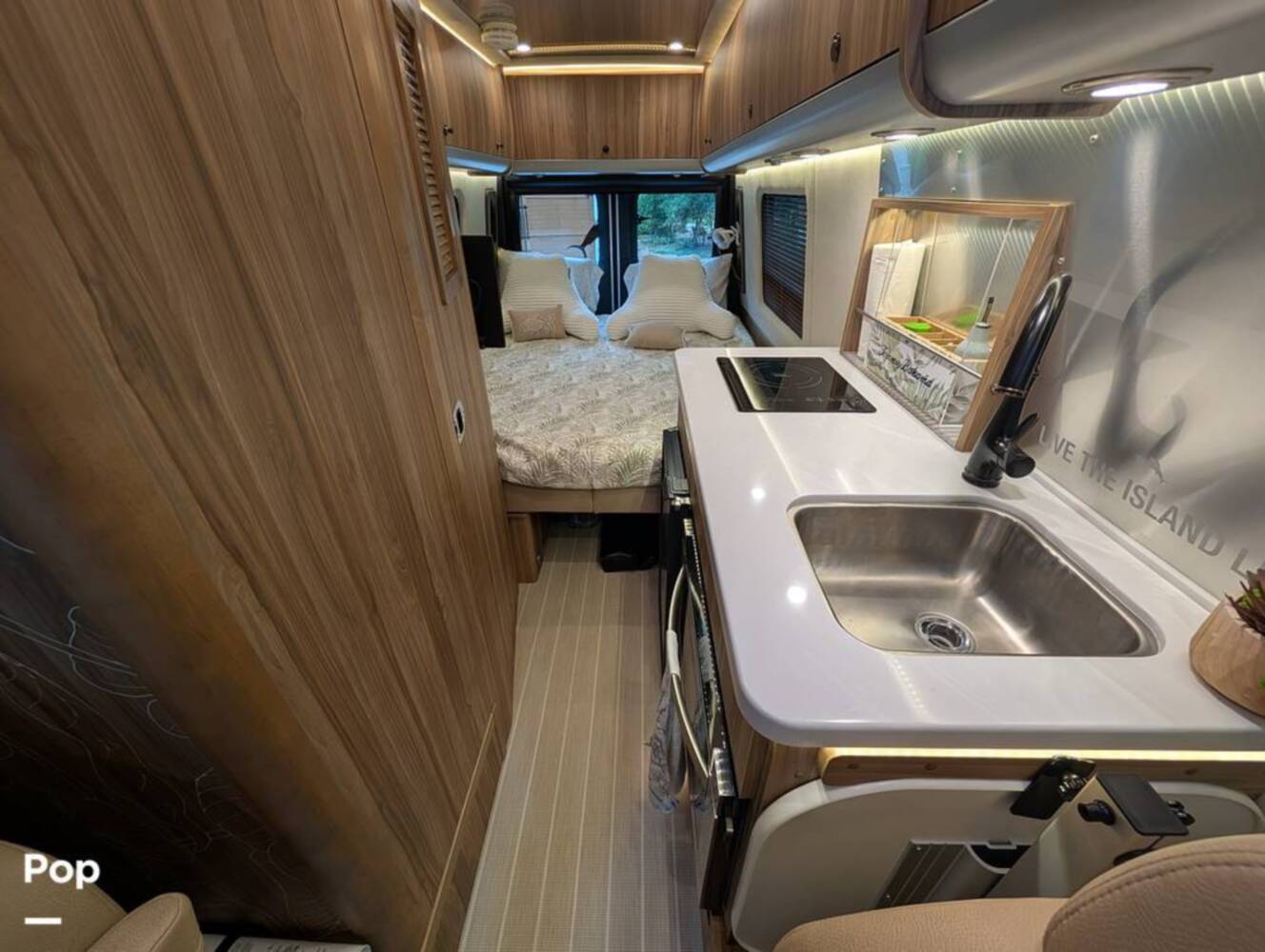 A photo of this 2023 Airstream Interstate Tommy Bahama E1 24GL