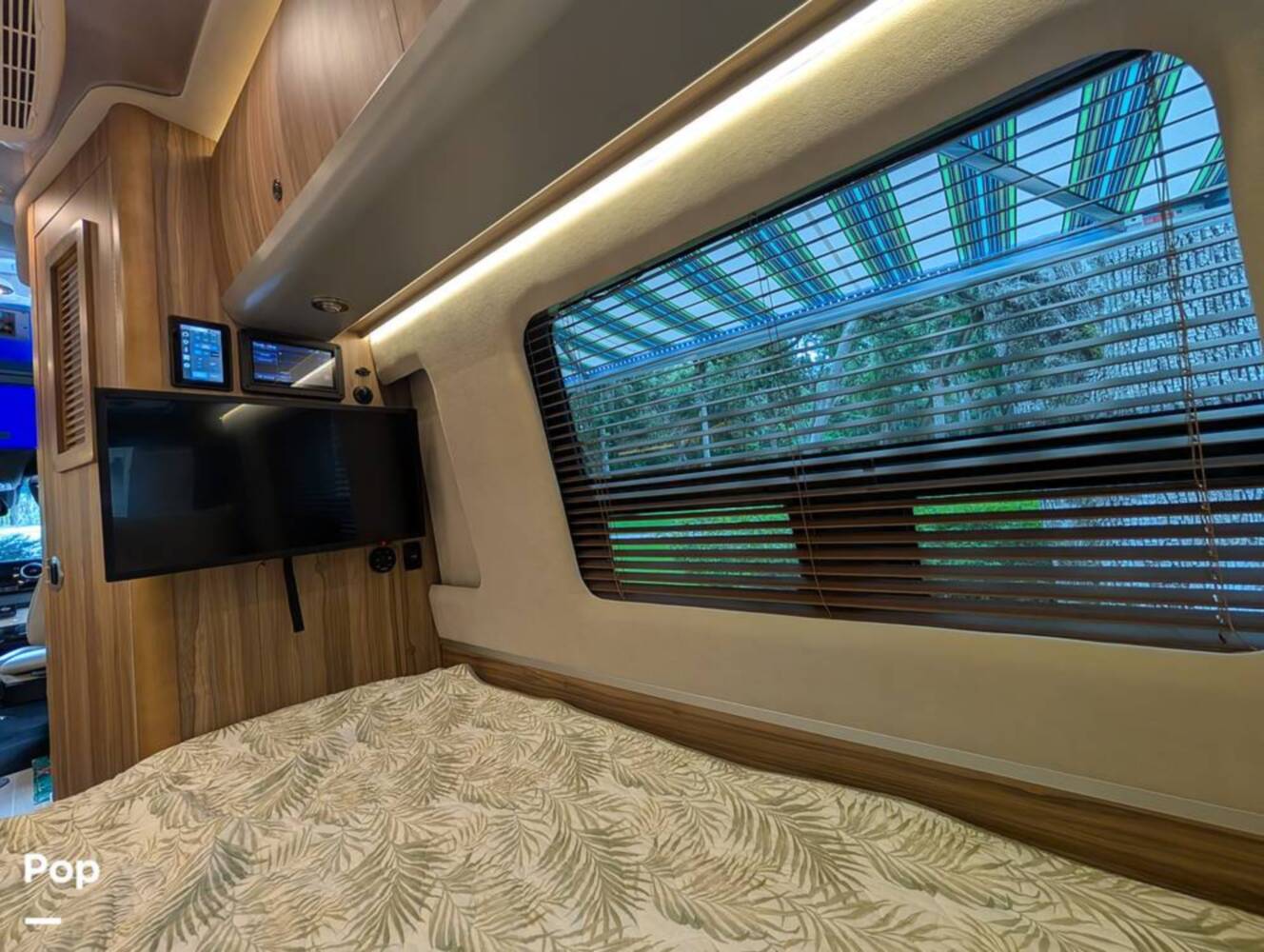 A photo of this 2023 Airstream Interstate Tommy Bahama E1 24GL
