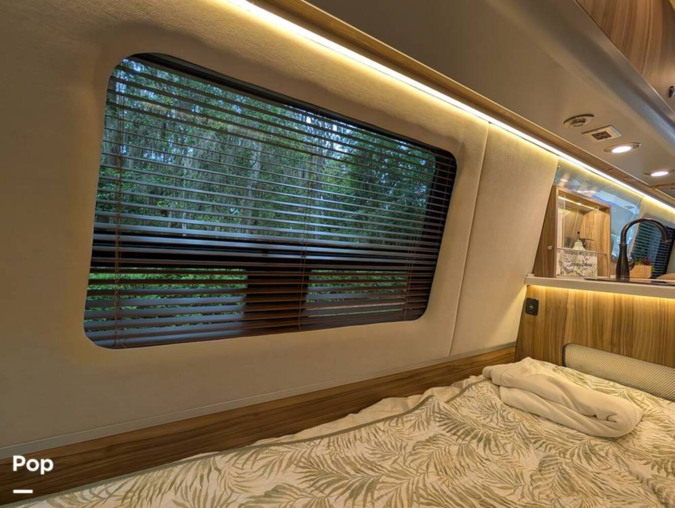 A photo of this 2023 Airstream Interstate Tommy Bahama E1 24GL