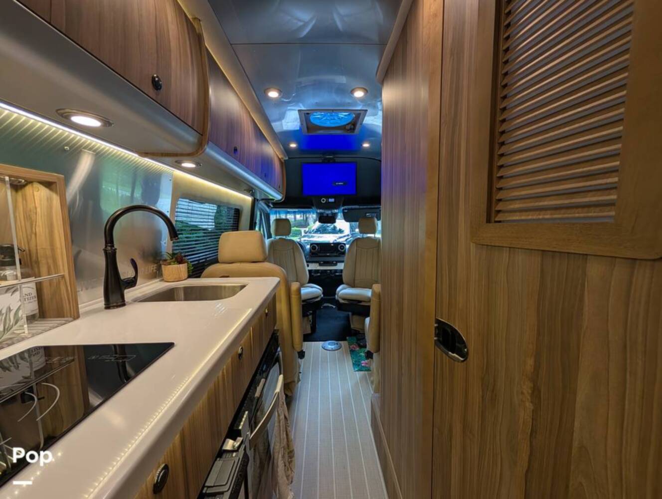 A photo of this 2023 Airstream Interstate Tommy Bahama E1 24GL