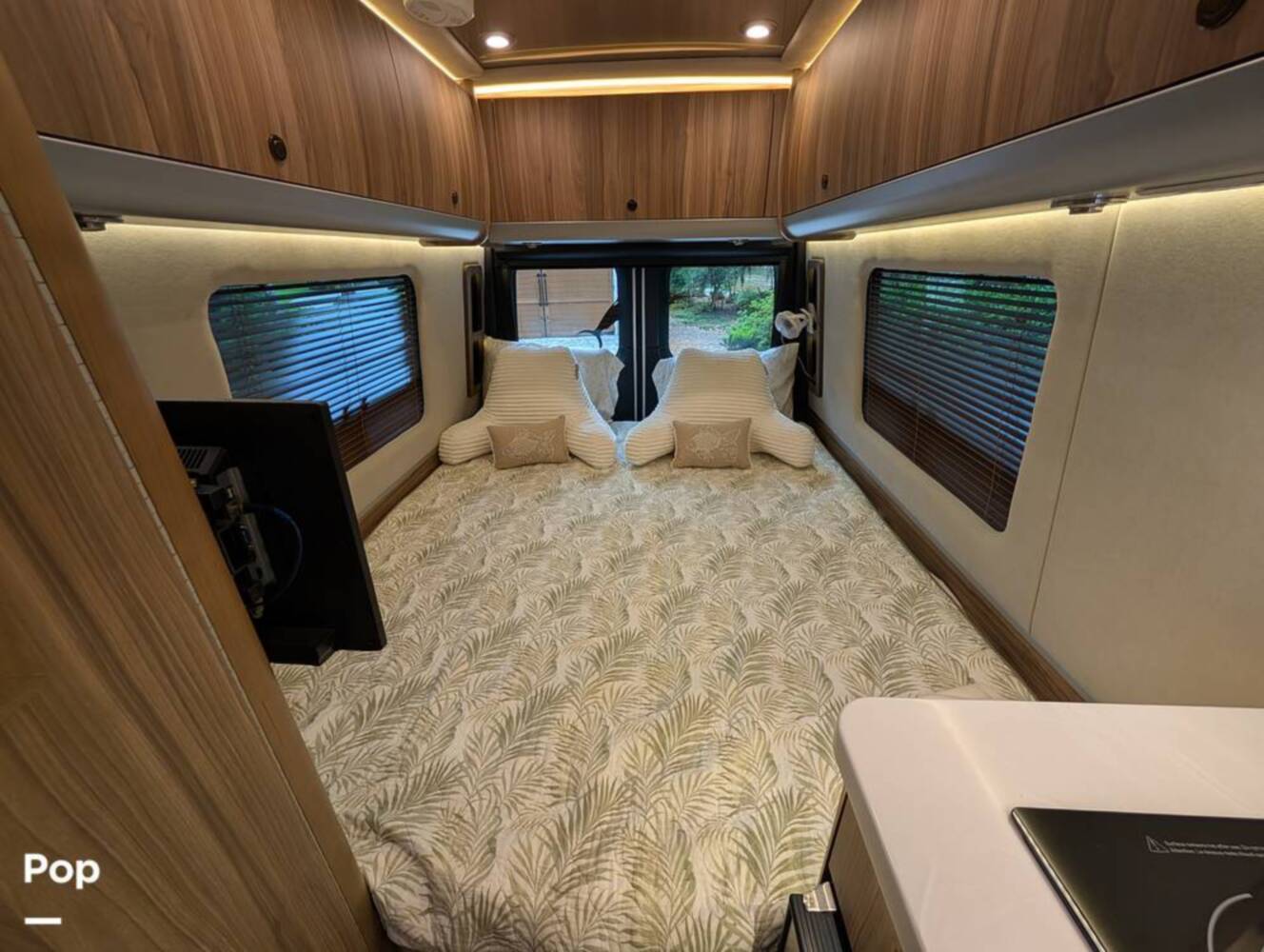 A photo of this 2023 Airstream Interstate Tommy Bahama E1 24GL