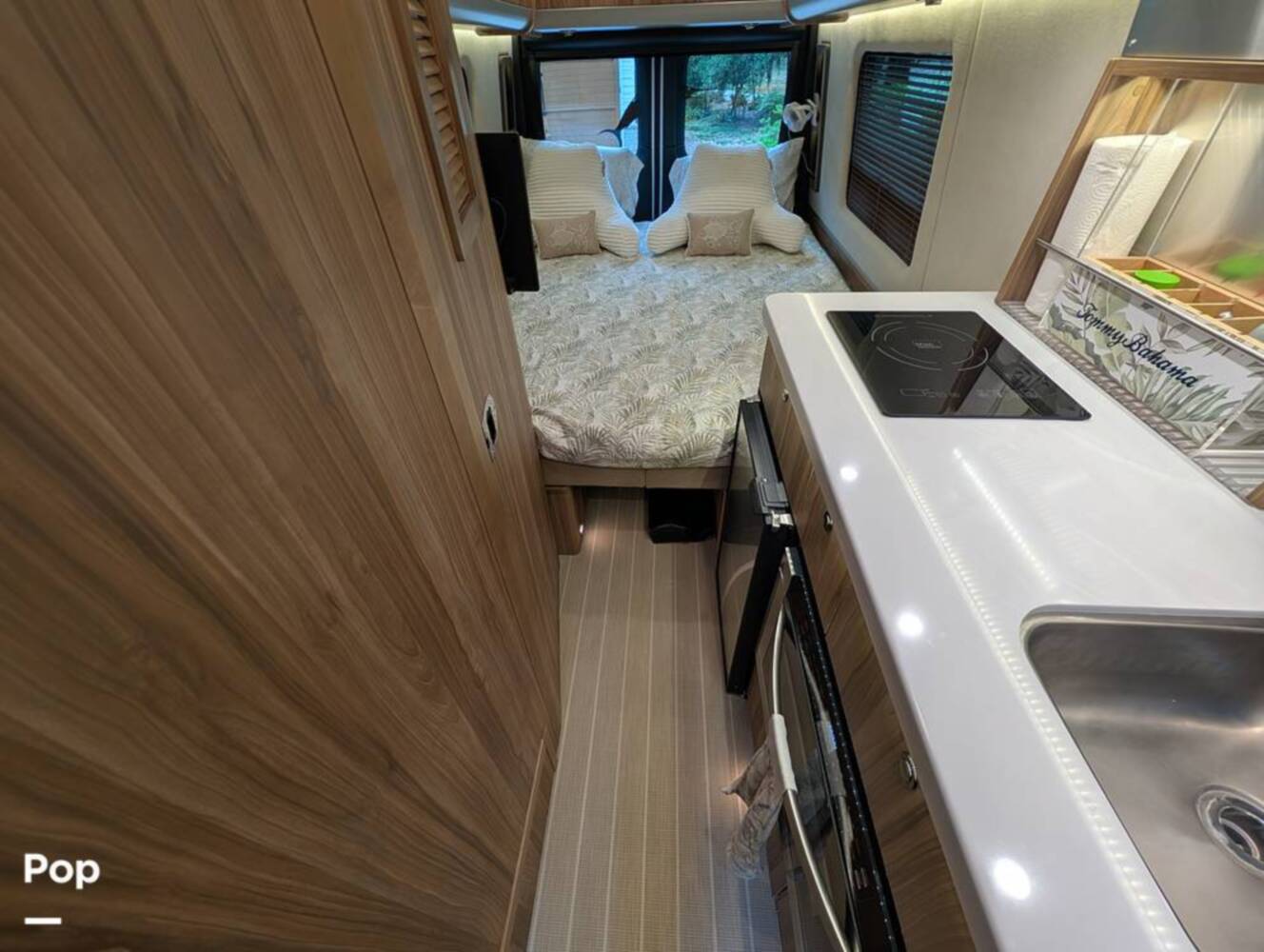 A photo of this 2023 Airstream Interstate Tommy Bahama E1 24GL