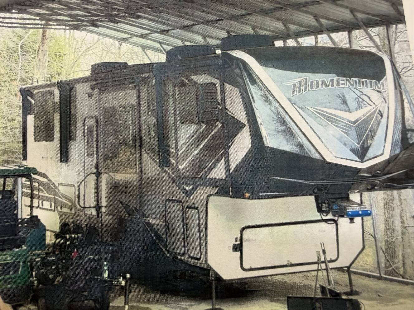 A photo of this 2022 Grand Design MOMENTUM 376THS
