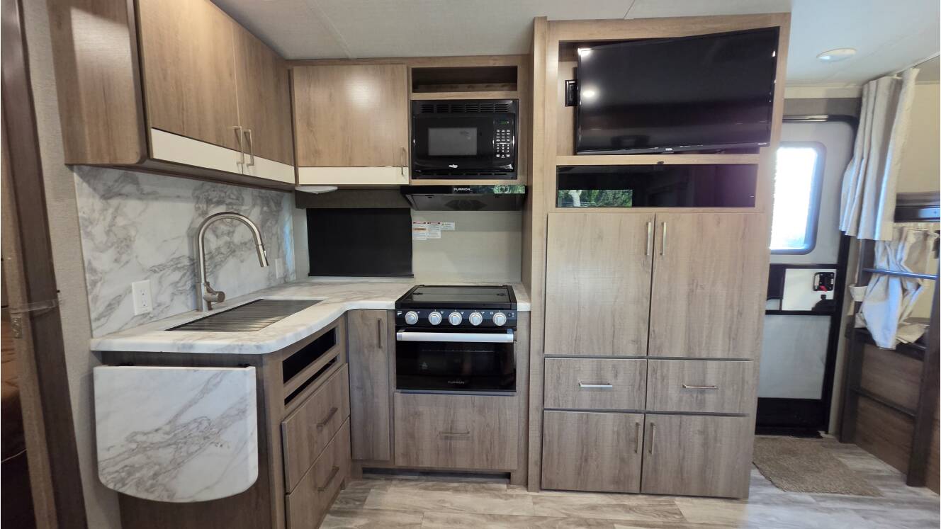 A photo of this 2023 Grand Design IMAGINE 2400BH