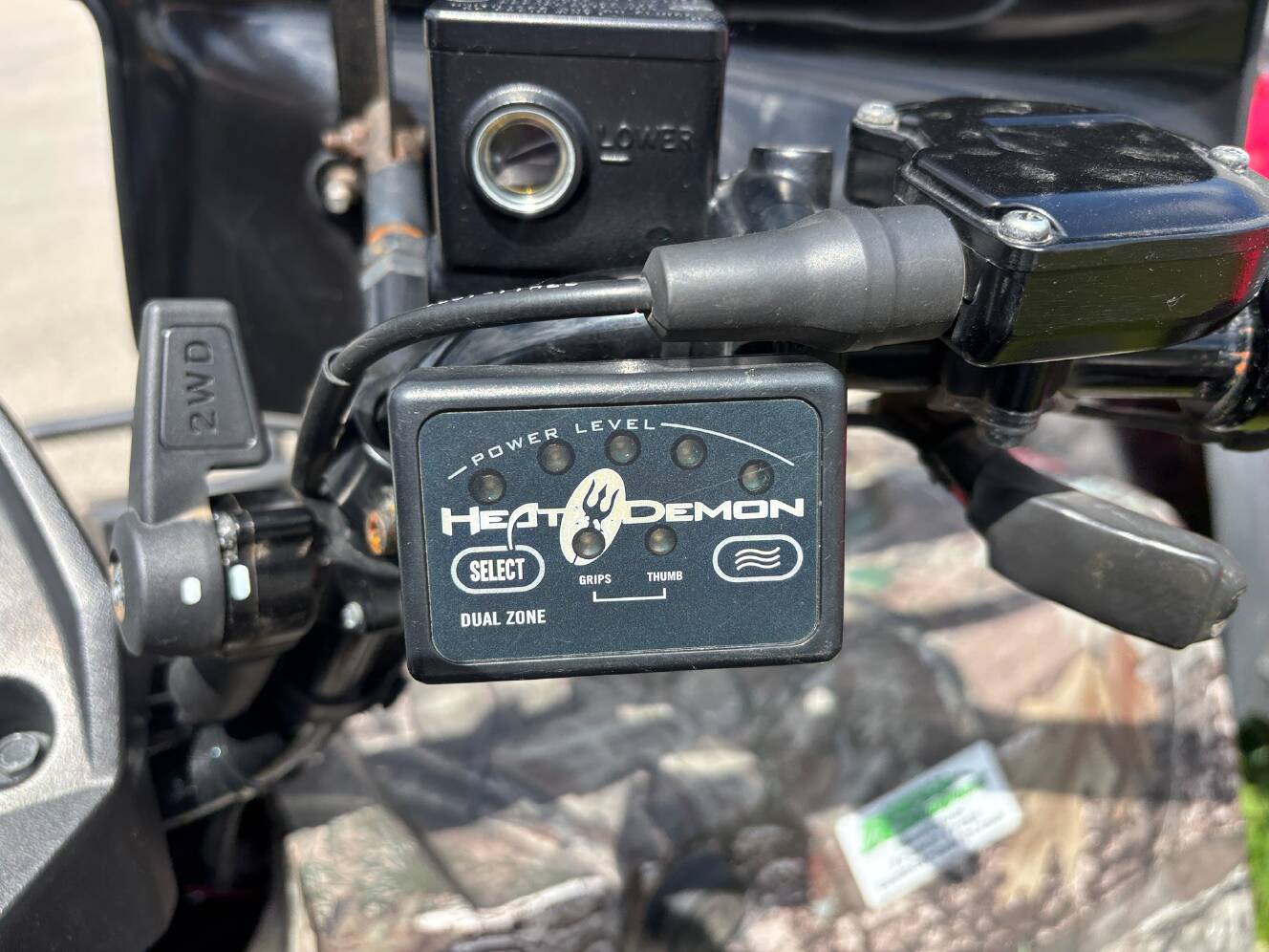 A photo of this 2022 Suzuki KingQuad 400ASi Camo