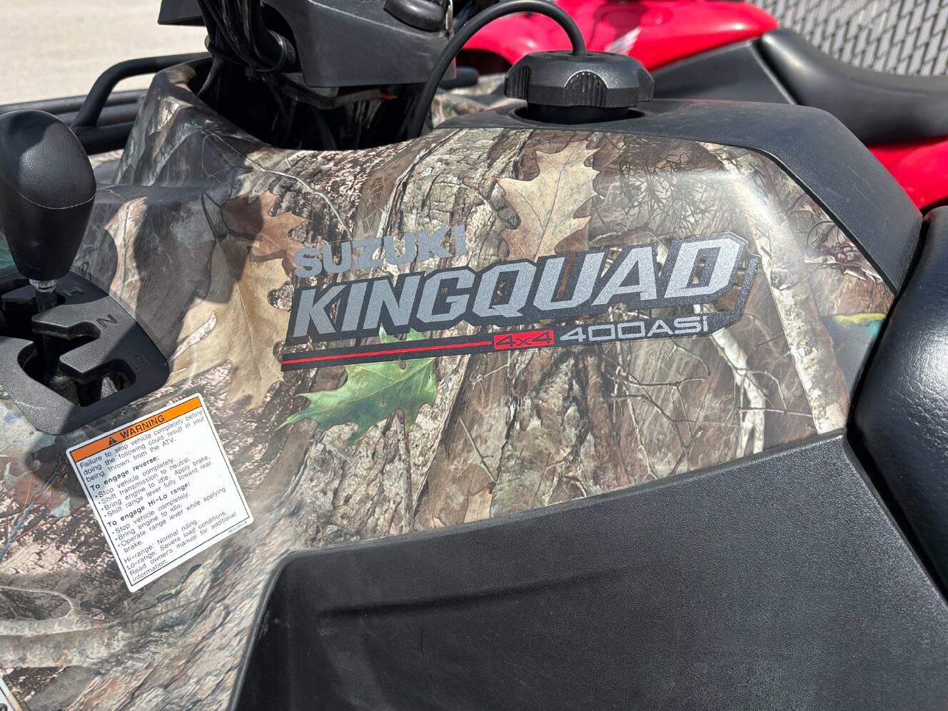 A photo of this 2022 Suzuki KingQuad 400ASi Camo