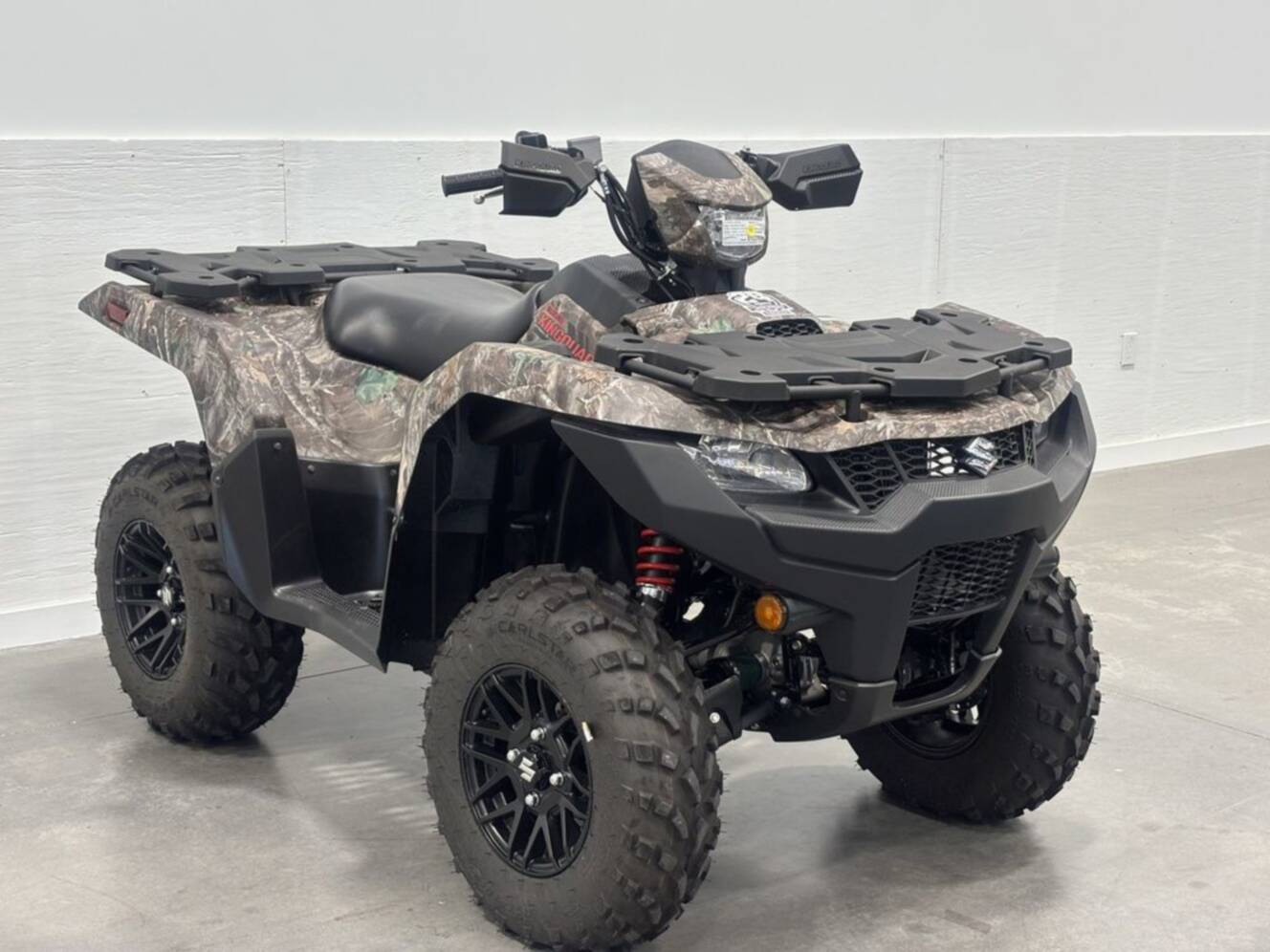 A photo of this 2025 Suzuki KingQuad 500 AXi Power Steering SE Camo