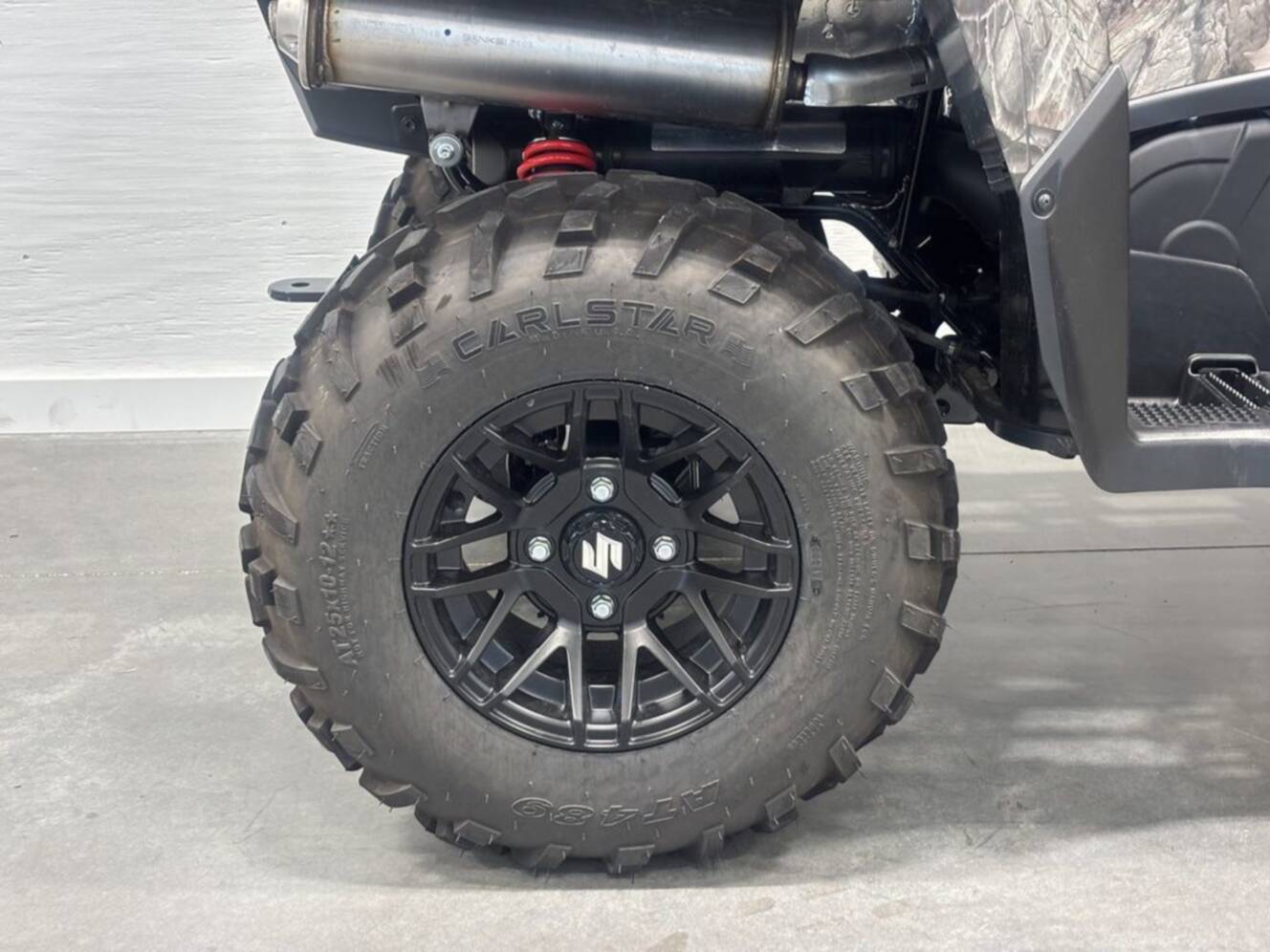 A photo of this 2025 Suzuki KingQuad 500 AXi Power Steering SE Camo