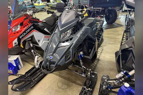 2026 Polaris® Patriot 9R PRO RMK 155 Gloss Black / Blue Dusk in red wing MN