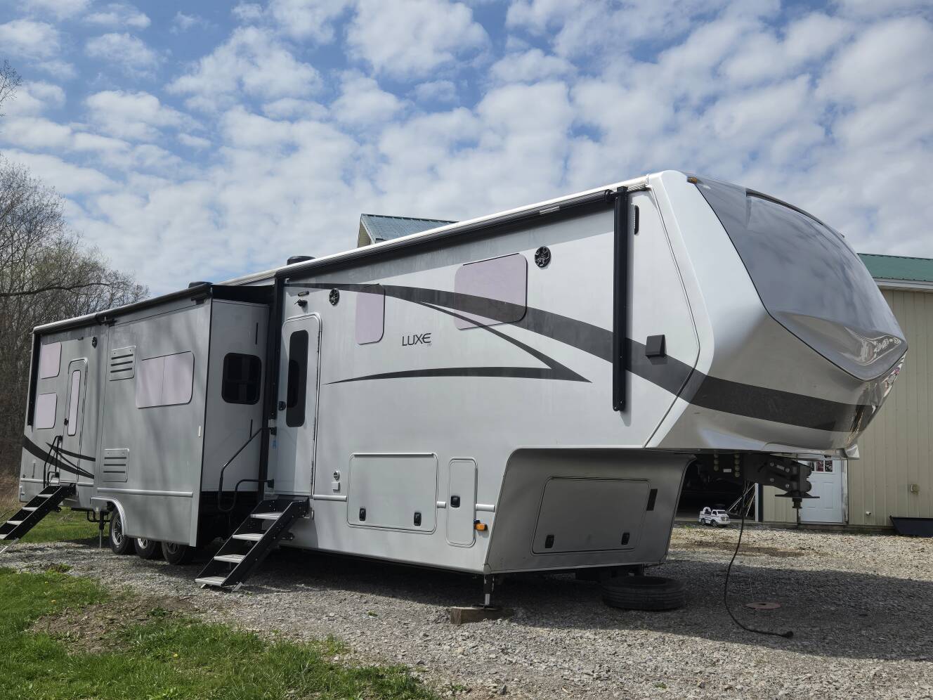 A photo of this 2021 Luxe TOY HAULER 48FB