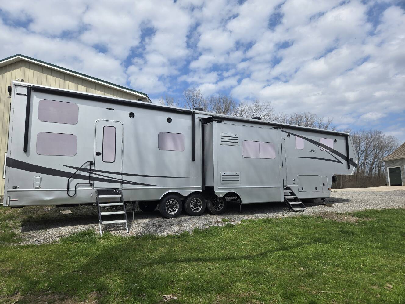 A photo of this 2021 Luxe TOY HAULER 48FB