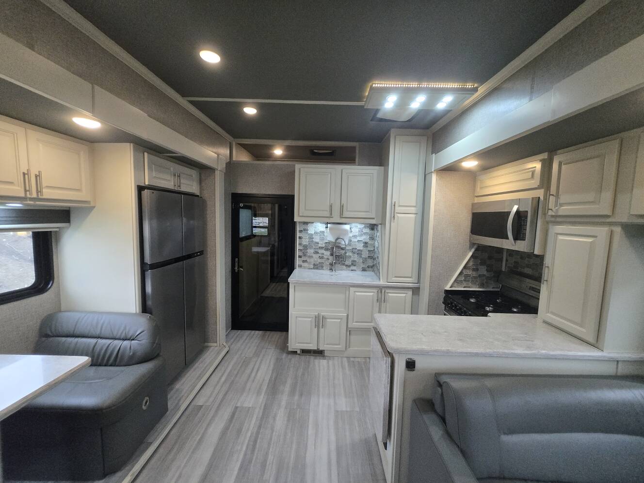 A photo of this 2021 Luxe TOY HAULER 48FB