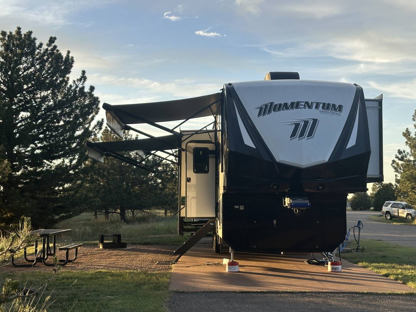 A photo of this 2025 Grand Design MOMENTUM M-CLASS 395MS