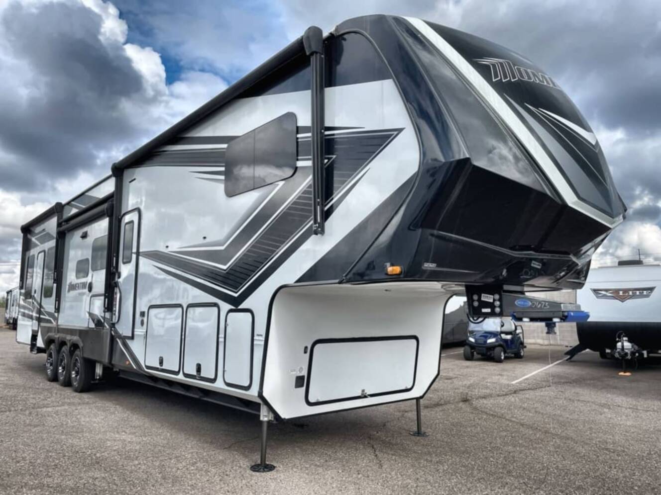 A photo of this 2023 Grand Design MOMENTUM M-CLASS 410CL
