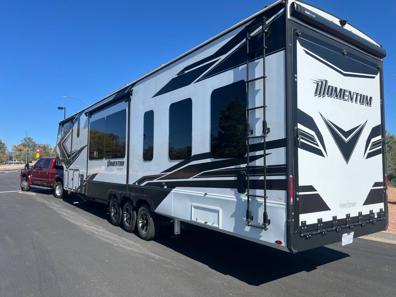 A photo of this 2023 Grand Design MOMENTUM M-CLASS 410CL