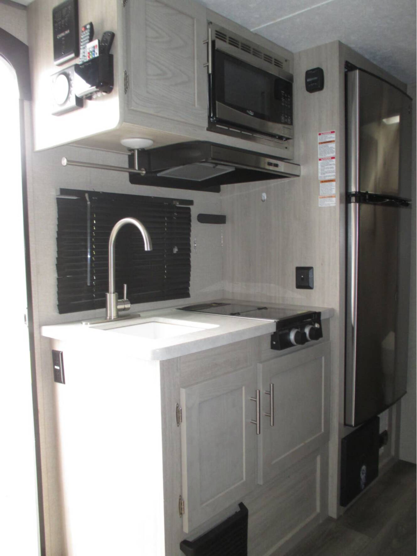 A photo of this 2023 Coachmen Catalina Summit Series 7 164BH East-West Queen, Bunk Be
