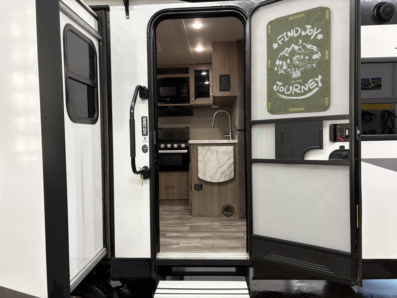 A photo of this 2022 Grand Design Imagine XLS 22RBE